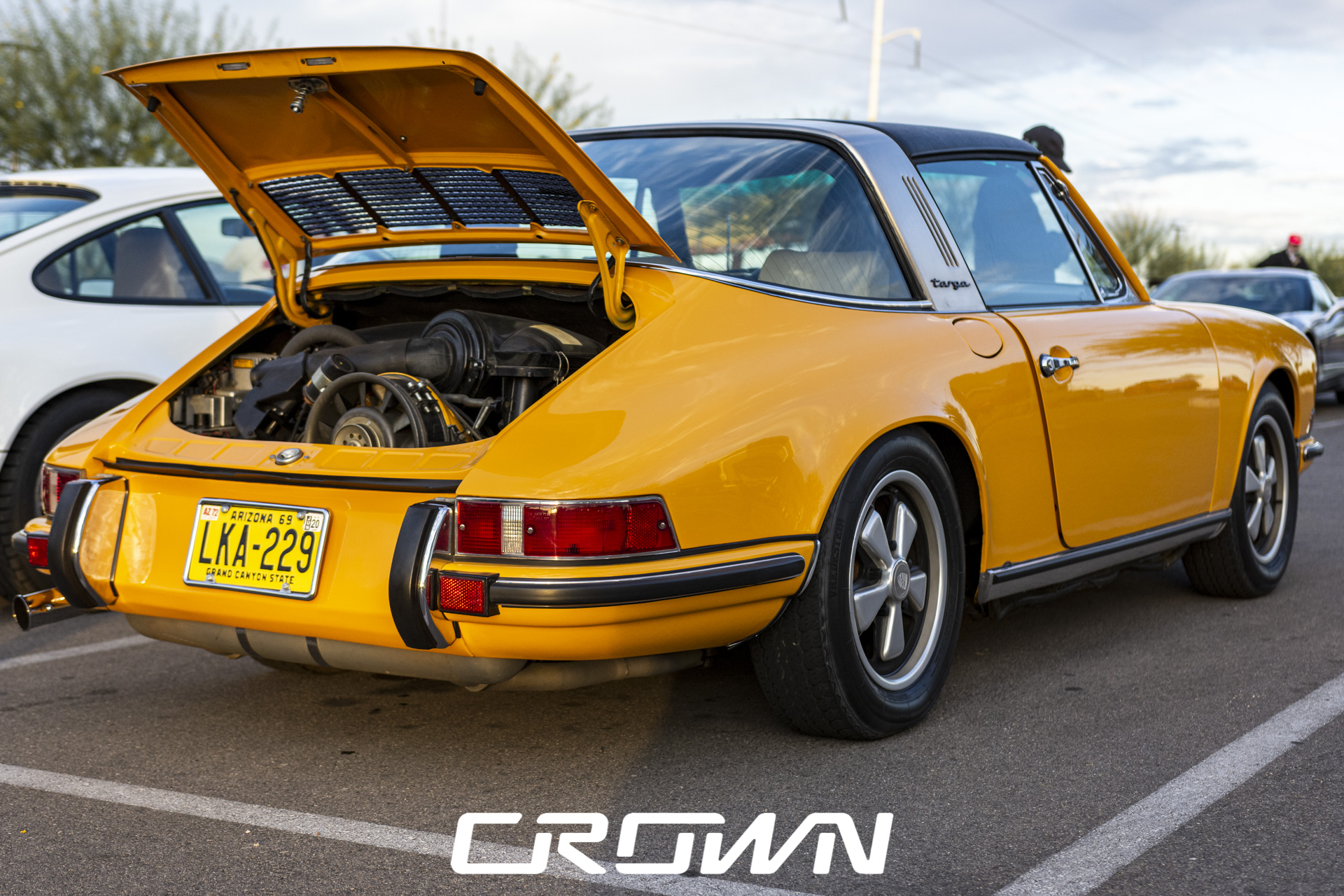 1972 Porsche 911 T Targa in yellow at cars and coffee tucson Arizona