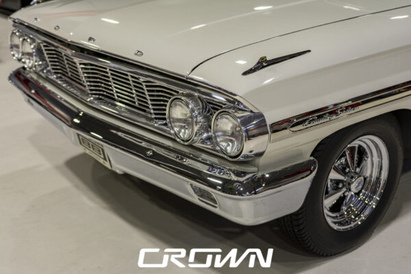 Grille and headlight detail on a restored 1964 Ford Country Sedan wagon