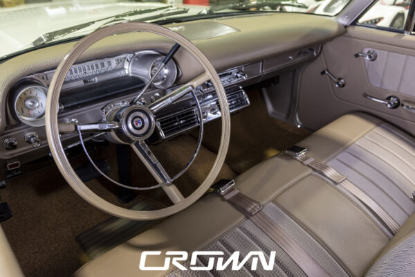 Steering wheel and dashboard detail in a restored 1964 Ford Country Sedan wagon