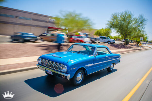 1963 Ford Falcon Sprint in motion, front three-quarter action shot with motion blur background