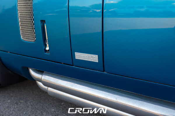 Side profile of a Shelby Daytona Coupe, chassis CSX9170, blue with white stripes