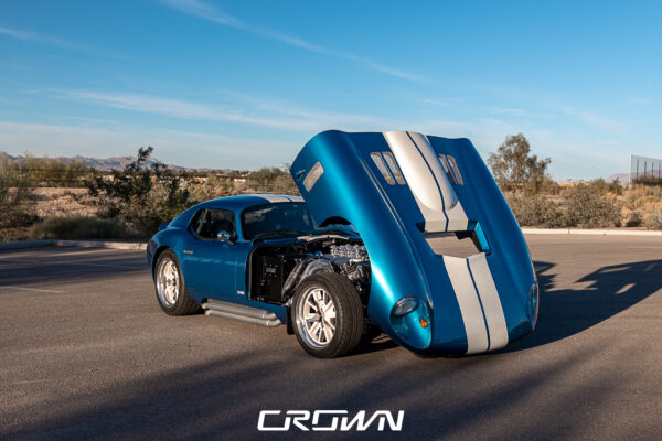 Rear three-quarter view of a Shelby Daytona Coupe, chassis CSX9170, blue with white stripes