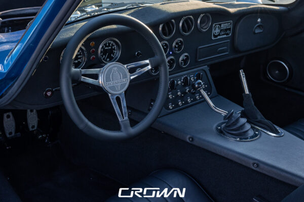 Interior seat and dashboard detail in a Shelby Daytona Coupe, chassis CSX9170, blue with white stripes