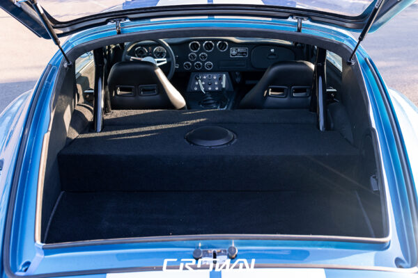 Exterior body line detail on a Shelby Daytona Coupe, chassis CSX9170, blue with white stripes