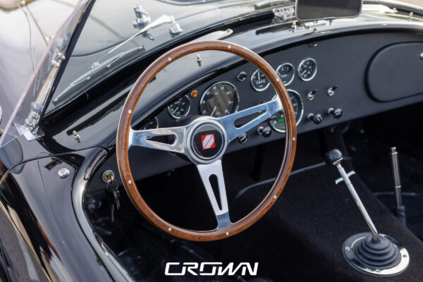 Side profile of a Superformance MKIII Cobra, chassis SP03627, solid black