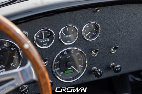 Rear taillight and badge detail on a Superformance MKIII Cobra, chassis SP03627, solid black