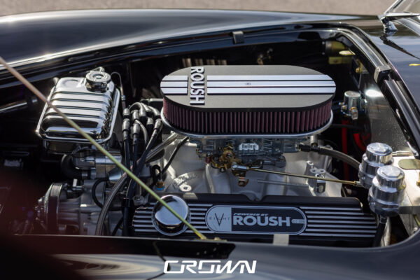 Rear three-quarter view of a Superformance MKIII Cobra, chassis SP03627, solid black