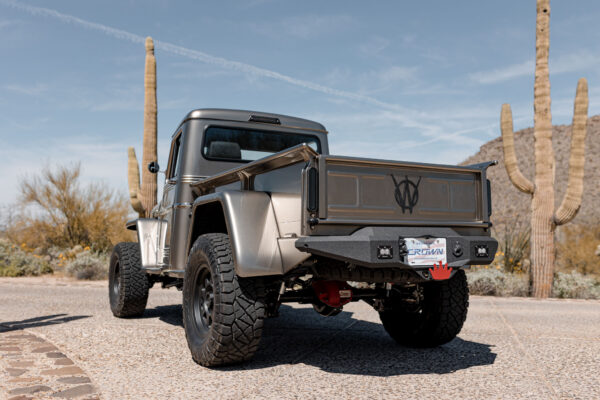 Custom 1961 Willys Jeep Pickup restomod built by Crown Customs in Tucson, Arizona, with restored bodywork, custom interior, 4x4 upgrades, and modern electronics.