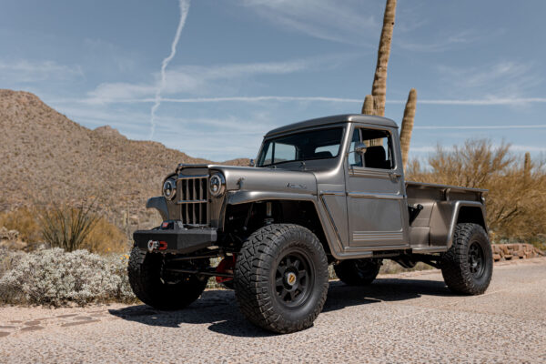 Custom 1961 Willys Jeep Pickup restomod built by Crown Customs in Tucson, Arizona, with restored bodywork, custom interior, 4x4 upgrades, and modern electronics.