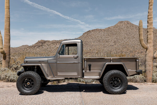 Custom 1961 Willys Jeep Pickup restomod built by Crown Customs in Tucson, Arizona, with restored bodywork, custom interior, 4x4 upgrades, and modern electronics.