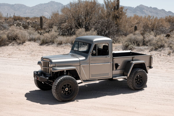 Custom 1961 Willys Jeep Pickup restomod built by Crown Customs in Tucson, Arizona, with restored bodywork, custom interior, 4x4 upgrades, and modern electronics.