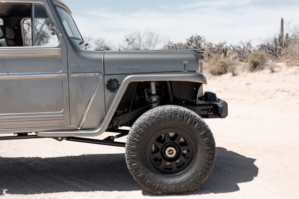 Custom 1961 Willys Jeep Pickup restomod built by Crown Customs in Tucson, Arizona, with restored bodywork, custom interior, 4x4 upgrades, and modern electronics.