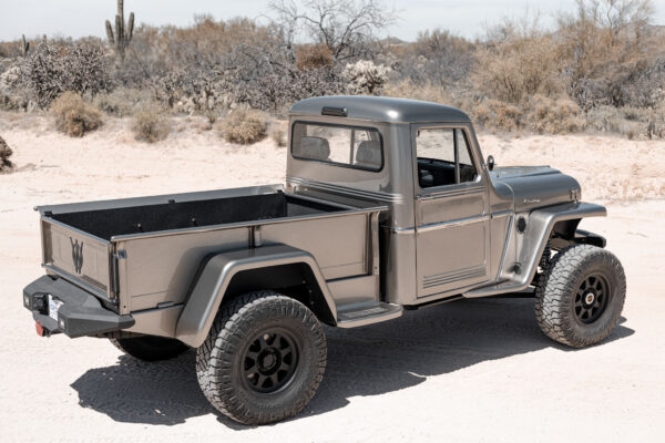 Custom 1961 Willys Jeep Pickup restomod built by Crown Customs in Tucson, Arizona, with restored bodywork, custom interior, 4x4 upgrades, and modern electronics.