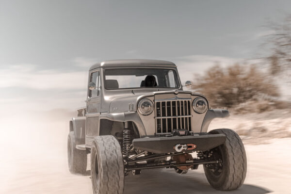 Custom 1961 Willys Jeep Pickup restomod built by Crown Customs in Tucson, Arizona, with restored bodywork, custom interior, 4x4 upgrades, and modern electronics.