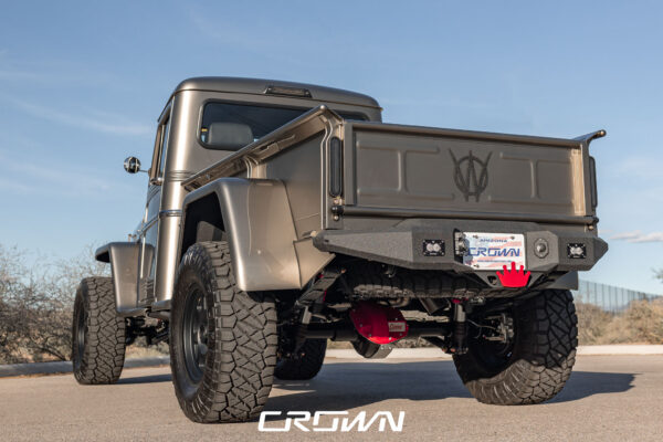 Custom 1961 Willys Jeep Pickup restomod built by Crown Customs in Tucson, Arizona, with restored bodywork, custom interior, 4x4 upgrades, and modern electronics.