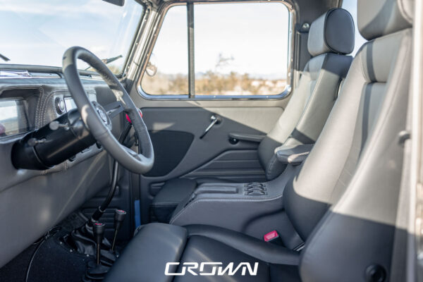 Custom 1961 Willys Jeep Pickup restomod built by Crown Customs in Tucson, Arizona, with restored bodywork, custom interior, 4x4 upgrades, and modern electronics.