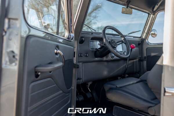 Custom 1961 Willys Jeep Pickup restomod built by Crown Customs in Tucson, Arizona, with restored bodywork, custom interior, 4x4 upgrades, and modern electronics.