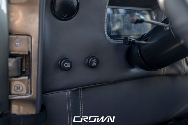 Custom 1961 Willys Jeep Pickup restomod built by Crown Customs in Tucson, Arizona, with restored bodywork, custom interior, 4x4 upgrades, and modern electronics.