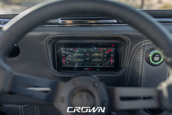 Custom 1961 Willys Jeep Pickup restomod built by Crown Customs in Tucson, Arizona, with restored bodywork, custom interior, 4x4 upgrades, and modern electronics.