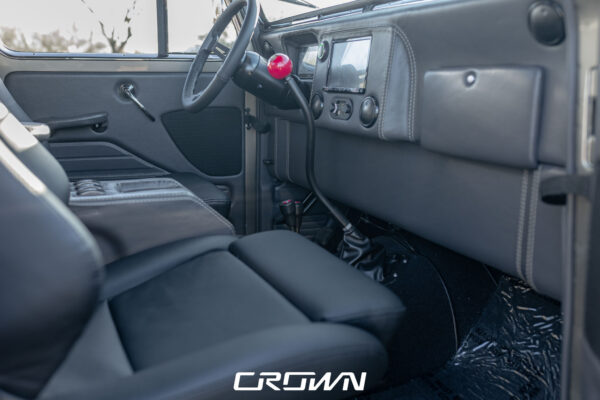 Custom 1961 Willys Jeep Pickup restomod built by Crown Customs in Tucson, Arizona, with restored bodywork, custom interior, 4x4 upgrades, and modern electronics.