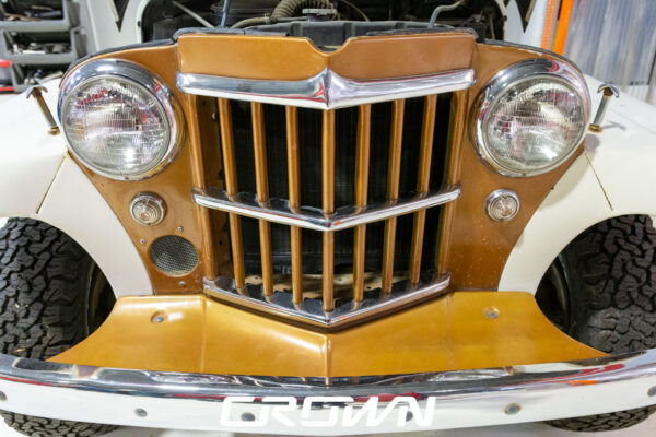 Custom 1961 Willys Jeep Pickup restomod built by Crown Customs in Tucson, Arizona, with restored bodywork, custom interior, 4x4 upgrades, and modern electronics.
