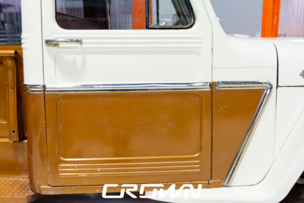 Custom 1961 Willys Jeep Pickup restomod built by Crown Customs in Tucson, Arizona, with restored bodywork, custom interior, 4x4 upgrades, and modern electronics.