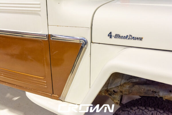 Custom 1961 Willys Jeep Pickup restomod built by Crown Customs in Tucson, Arizona, with restored bodywork, custom interior, 4x4 upgrades, and modern electronics.