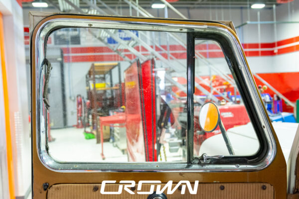 Custom 1961 Willys Jeep Pickup restomod built by Crown Customs in Tucson, Arizona, with restored bodywork, custom interior, 4x4 upgrades, and modern electronics.