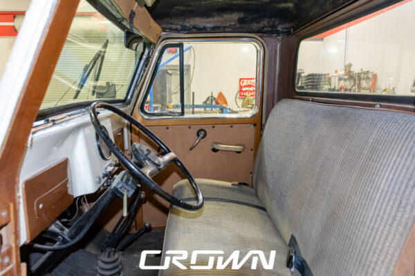 Custom 1961 Willys Jeep Pickup restomod built by Crown Customs in Tucson, Arizona, with restored bodywork, custom interior, 4x4 upgrades, and modern electronics.