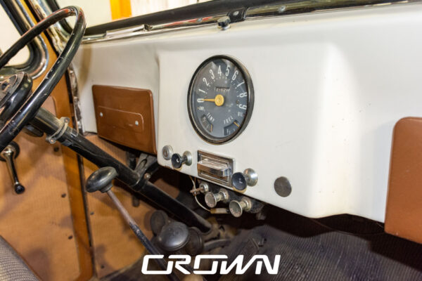 Custom 1961 Willys Jeep Pickup restomod built by Crown Customs in Tucson, Arizona, with restored bodywork, custom interior, 4x4 upgrades, and modern electronics.