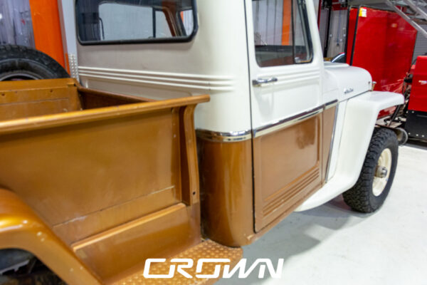 Custom 1961 Willys Jeep Pickup restomod built by Crown Customs in Tucson, Arizona, with restored bodywork, custom interior, 4x4 upgrades, and modern electronics.