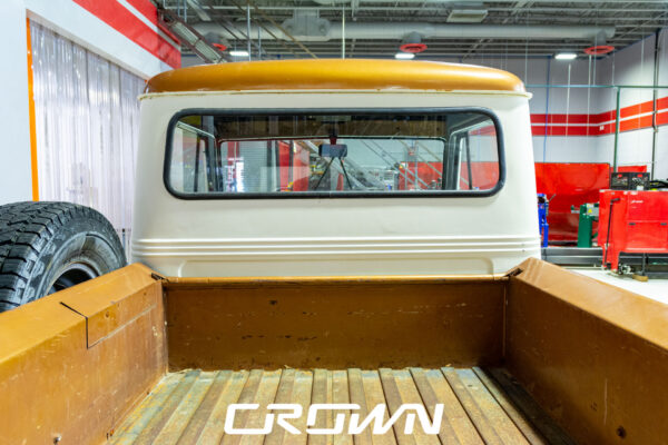 Custom 1961 Willys Jeep Pickup restomod built by Crown Customs in Tucson, Arizona, with restored bodywork, custom interior, 4x4 upgrades, and modern electronics.