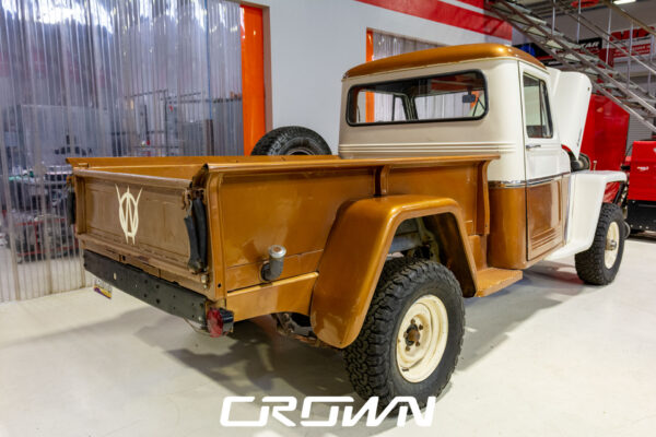 Custom 1961 Willys Jeep Pickup restomod built by Crown Customs in Tucson, Arizona, with restored bodywork, custom interior, 4x4 upgrades, and modern electronics.