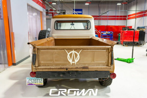 Custom 1961 Willys Jeep Pickup restomod built by Crown Customs in Tucson, Arizona, with restored bodywork, custom interior, 4x4 upgrades, and modern electronics.