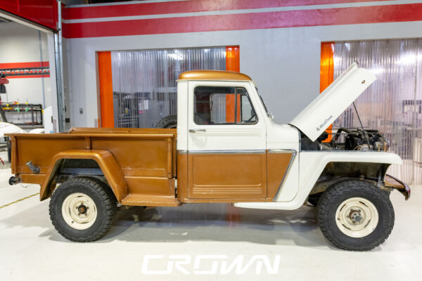 Custom 1961 Willys Jeep Pickup restomod built by Crown Customs in Tucson, Arizona, with restored bodywork, custom interior, 4x4 upgrades, and modern electronics.
