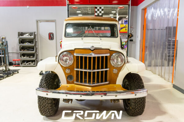 Custom 1961 Willys Jeep Pickup restomod built by Crown Customs in Tucson, Arizona, with restored bodywork, custom interior, 4x4 upgrades, and modern electronics.