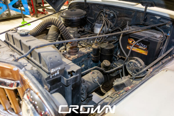 Custom 1961 Willys Jeep Pickup restomod built by Crown Customs in Tucson, Arizona, with restored bodywork, custom interior, 4x4 upgrades, and modern electronics.