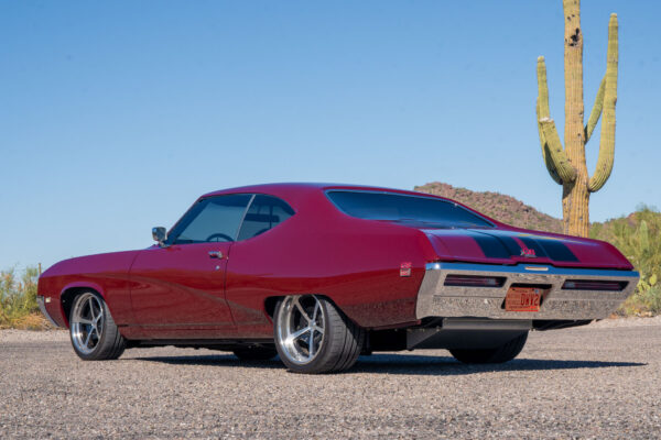 Custom 1969 Buick GS400 restomod built by Crown Customs in Tucson, Arizona, with LS376/480 power, 4L70-E automatic transmission, Forgeline wheels, black stripes, and custom interior work.