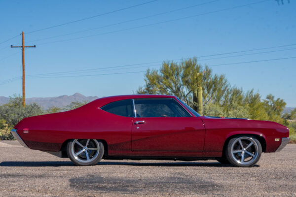 Custom 1969 Buick GS400 restomod built by Crown Customs in Tucson, Arizona, with LS376/480 power, 4L70-E automatic transmission, Forgeline wheels, black stripes, and custom interior work.