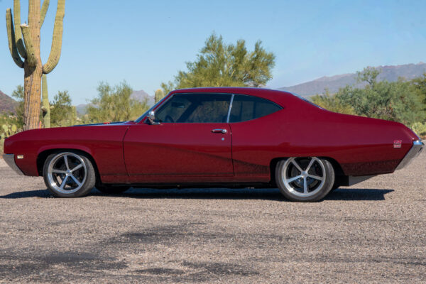 Custom 1969 Buick GS400 restomod built by Crown Customs in Tucson, Arizona, with LS376/480 power, 4L70-E automatic transmission, Forgeline wheels, black stripes, and custom interior work.