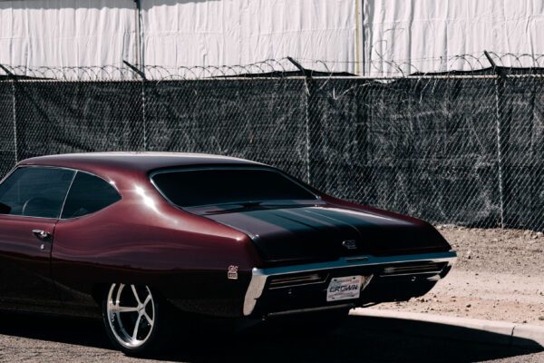 Custom 1969 Buick GS400 restomod built by Crown Customs in Tucson, Arizona, with LS376/480 power, 4L70-E automatic transmission, Forgeline wheels, black stripes, and custom interior work.
