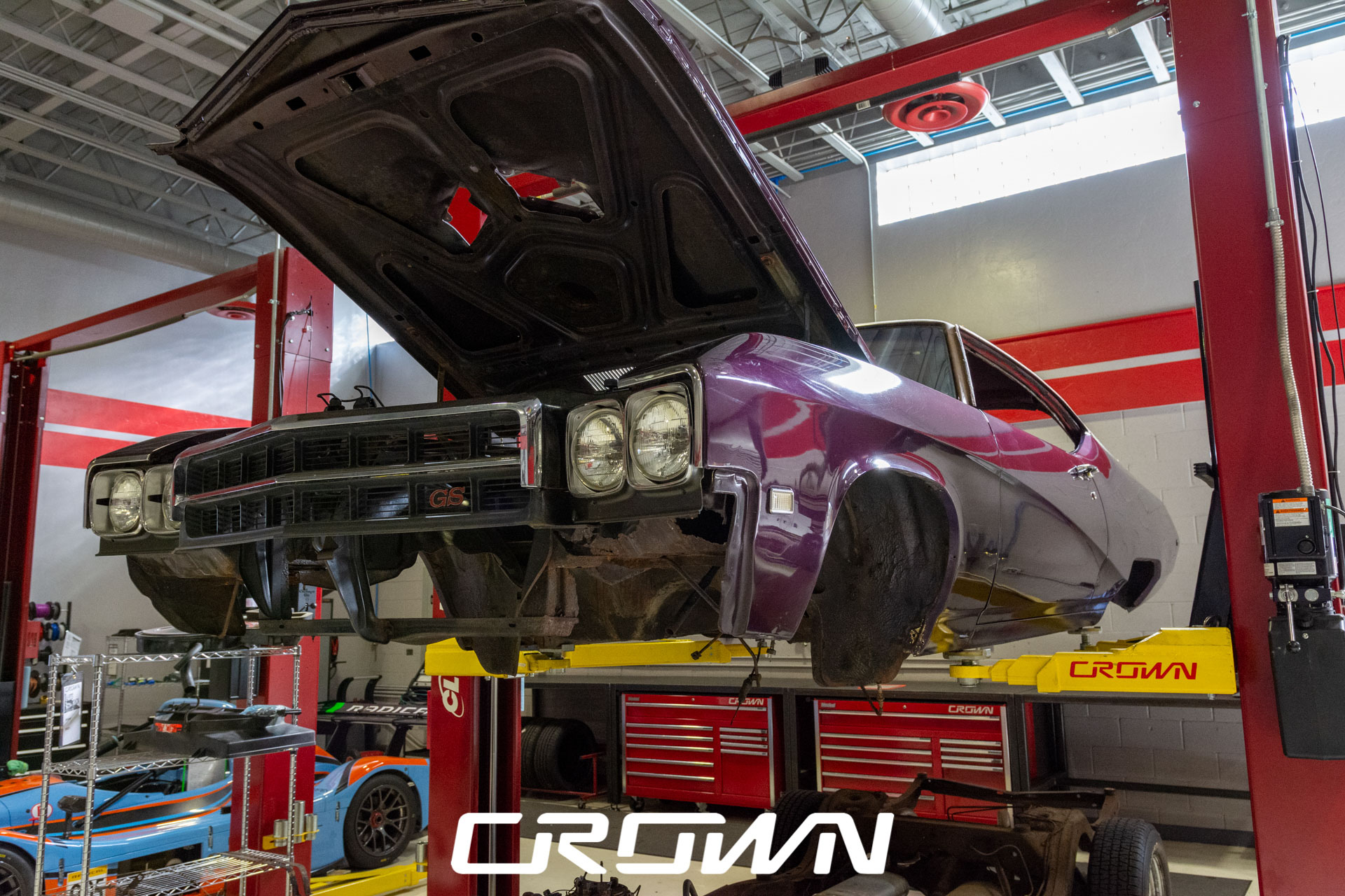 Custom 1969 Buick GS400 driver restomod by Crown Customs Custom 1969 Buick GS400 restomod built by Crown Customs in Tucson, Arizona, with LS376/480 power, 4L70-E automatic transmission, Forgeline wheels, black stripes, and custom interior work.