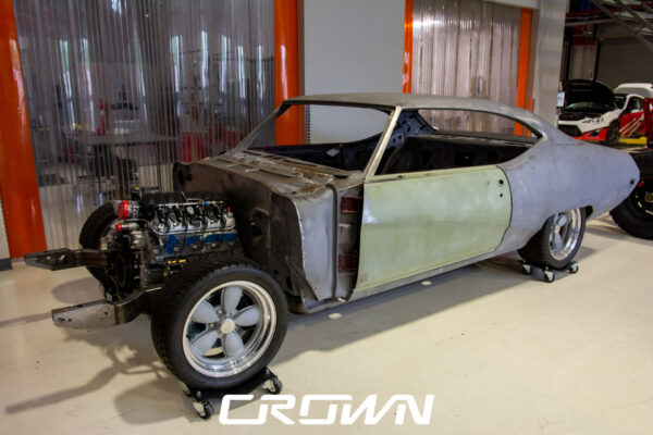 Custom 1969 Buick GS400 restomod built by Crown Customs in Tucson, Arizona, with LS376/480 power, 4L70-E automatic transmission, Forgeline wheels, black stripes, and custom interior work.