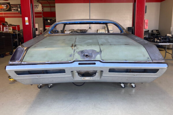 Custom 1969 Buick GS400 restomod built by Crown Customs in Tucson, Arizona, with LS376/480 power, 4L70-E automatic transmission, Forgeline wheels, black stripes, and custom interior work.
