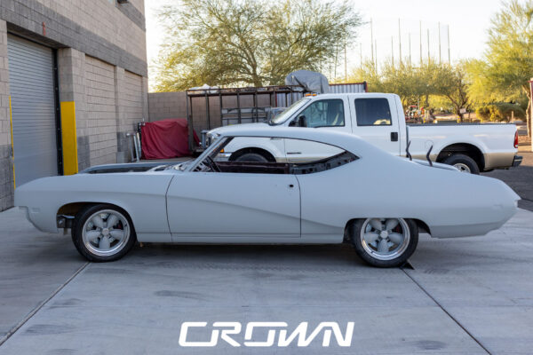 Custom 1969 Buick GS400 restomod built by Crown Customs in Tucson, Arizona, with LS376/480 power, 4L70-E automatic transmission, Forgeline wheels, black stripes, and custom interior work.