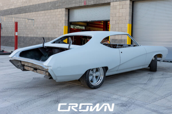 Custom 1969 Buick GS400 restomod built by Crown Customs in Tucson, Arizona, with LS376/480 power, 4L70-E automatic transmission, Forgeline wheels, black stripes, and custom interior work.