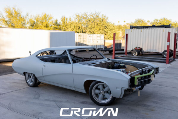 Custom 1969 Buick GS400 restomod built by Crown Customs in Tucson, Arizona, with LS376/480 power, 4L70-E automatic transmission, Forgeline wheels, black stripes, and custom interior work.