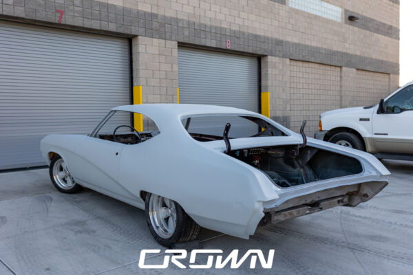 Custom 1969 Buick GS400 restomod built by Crown Customs in Tucson, Arizona, with LS376/480 power, 4L70-E automatic transmission, Forgeline wheels, black stripes, and custom interior work.