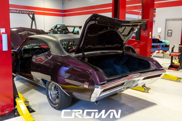 Custom 1969 Buick GS400 restomod built by Crown Customs in Tucson, Arizona, with LS376/480 power, 4L70-E automatic transmission, Forgeline wheels, black stripes, and custom interior work.