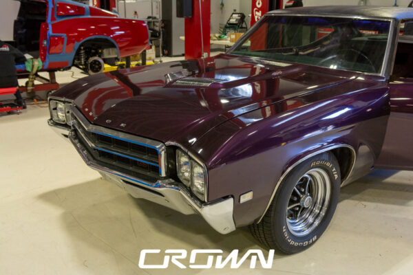 Custom 1969 Buick GS400 restomod built by Crown Customs in Tucson, Arizona, with LS376/480 power, 4L70-E automatic transmission, Forgeline wheels, black stripes, and custom interior work.